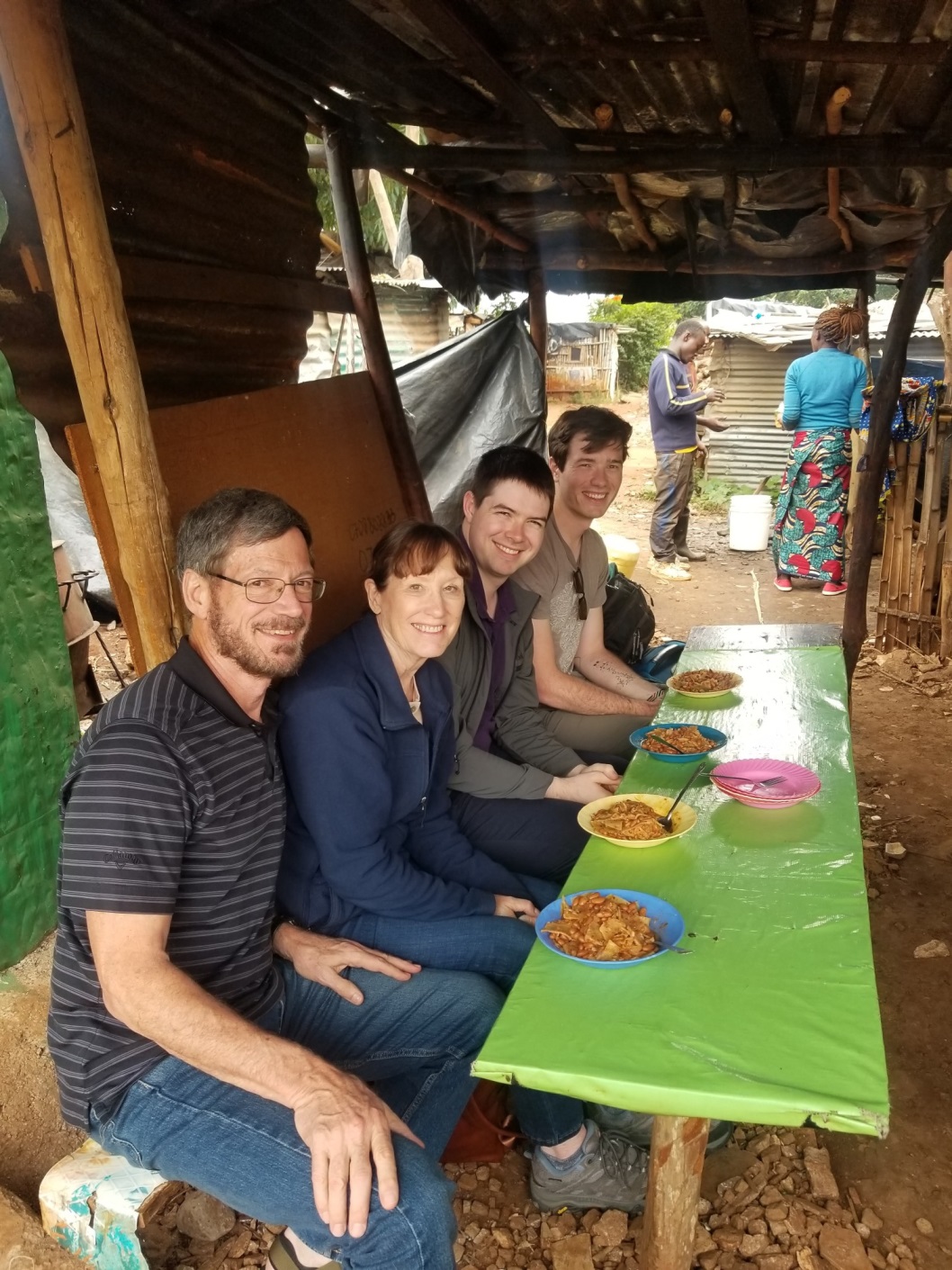 My family and I enjoying lunch at a kibanda