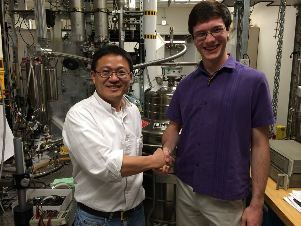 Me shaking hands with Dr. Wei Pan