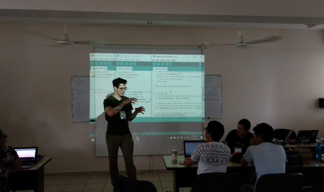 Me teaching a class using a projector