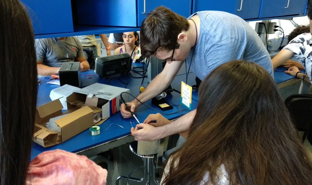 Me teaching students how to solder